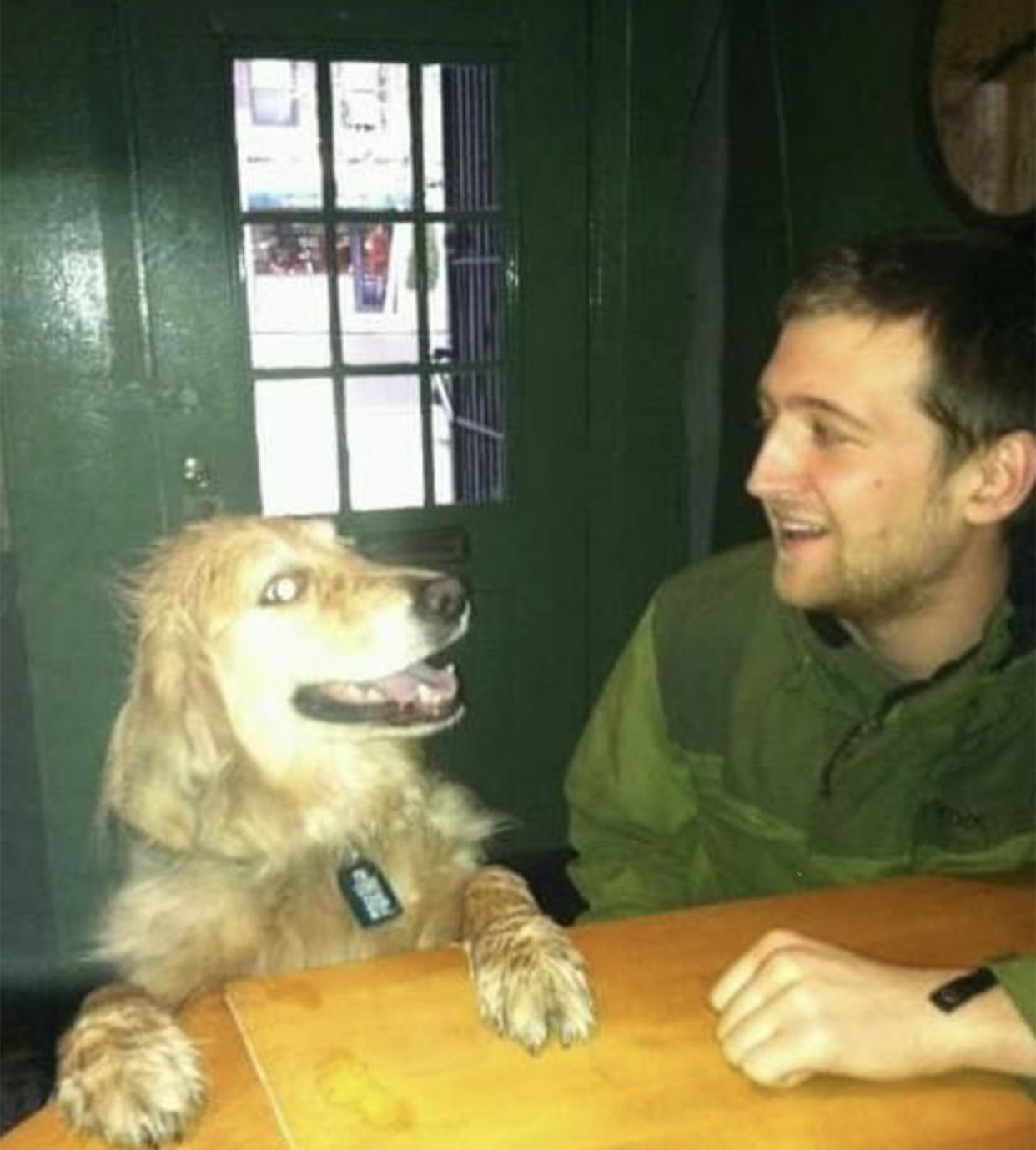 Kevin Clarke with a golden retriever