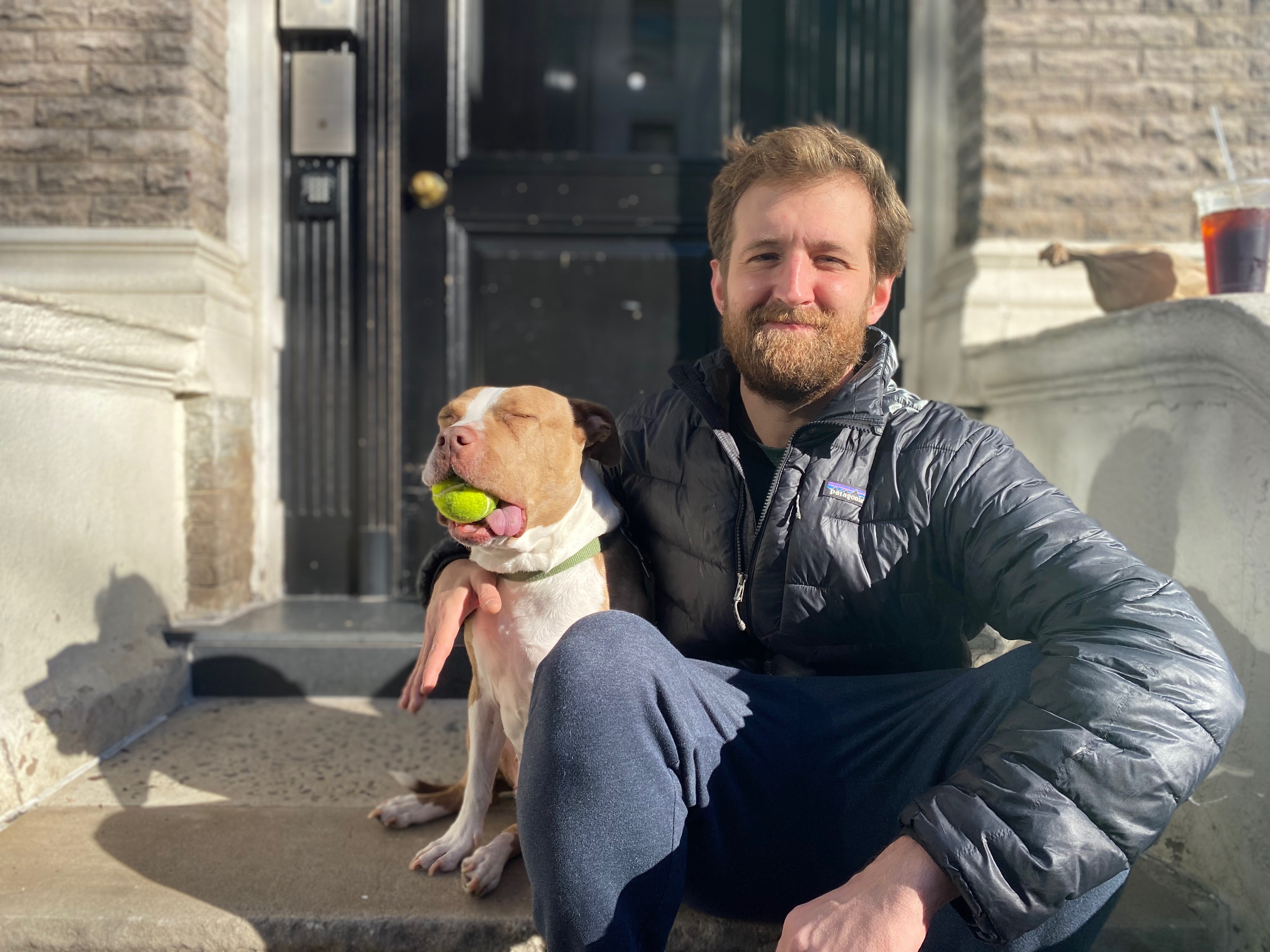 Kevin Clarke, The Dog Vibes founder, with a dog